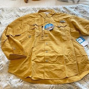 Columbia shirt, goldish yellow.